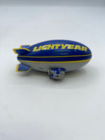 Mattel Disney•Pixar Car Aloft (The Lightyear Blimp, “Piston Cup Race Day” Die-Cast)