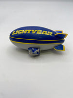 Mattel Disney•Pixar Car Aloft (The Lightyear Blimp, “Piston Cup Race Day” Die-Cast)