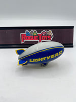 Mattel Disney•Pixar Car Aloft (The Lightyear Blimp, “Piston Cup Race Day” Die-Cast)