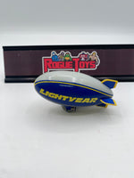 Mattel Disney•Pixar Car Aloft (The Lightyear Blimp, “Piston Cup Race Day” Die-Cast)