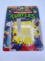 Playmates 1990 Teenage Mutant Ninja Turtles Slash (Purple Belt Variant with Yellow “S”)