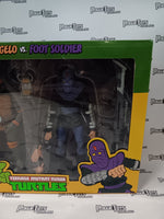 Neca Teenage Mutant Ninja Turtles Cartoon Michelangelo vs Foot Soldier